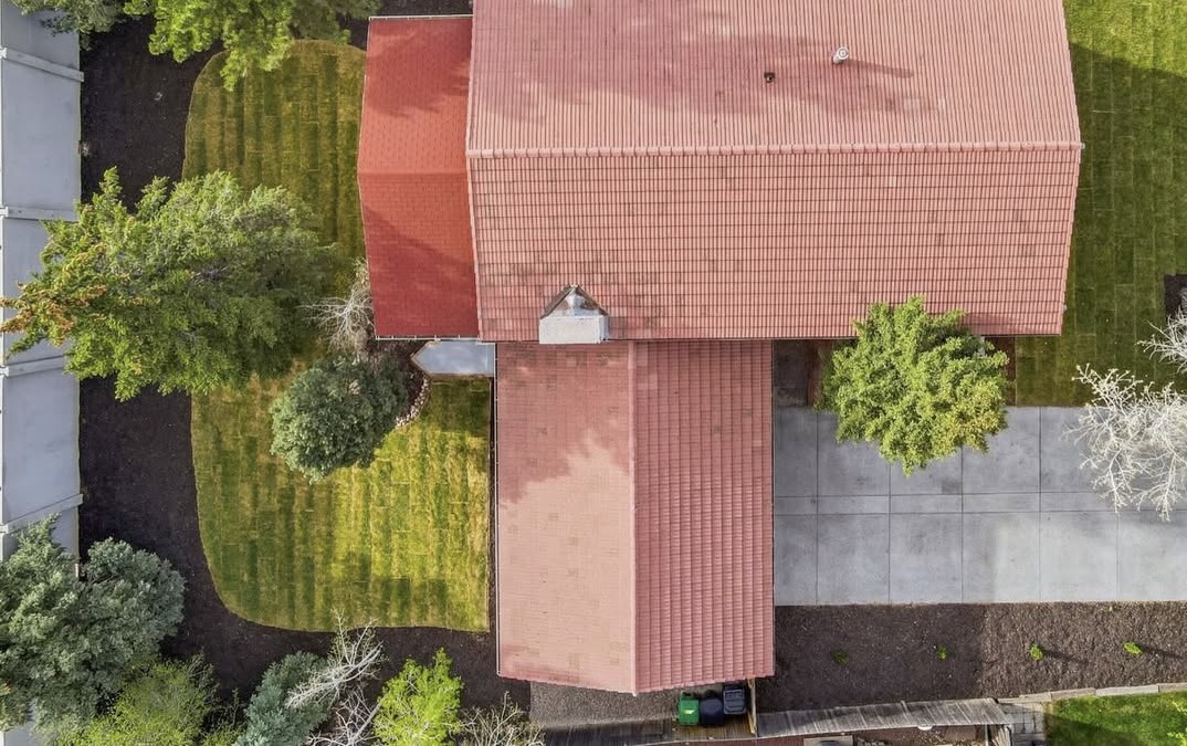 Aerial drone photo of a home and its lot