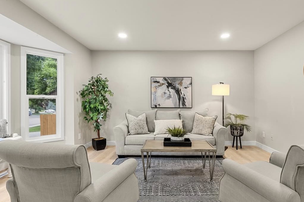 Staged living room with two armchairs