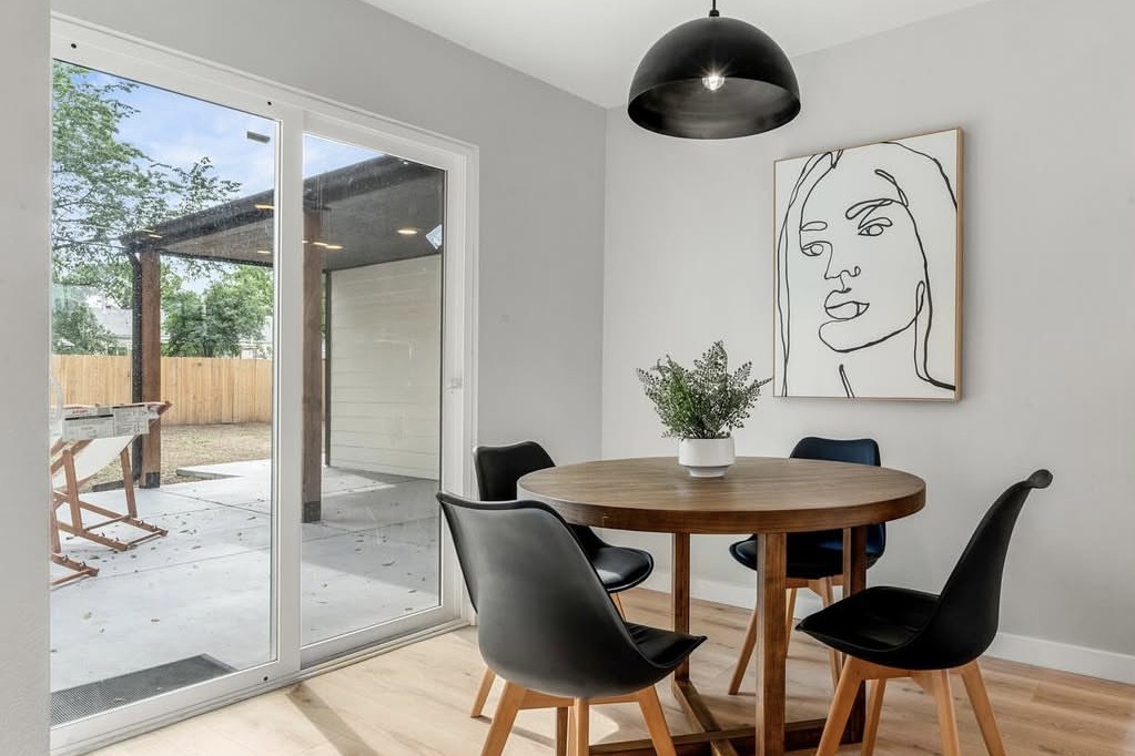 Dining nook with a sliding door to the covered patio