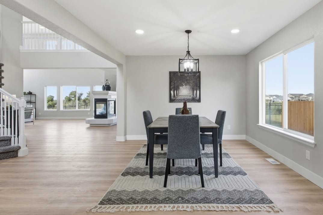 Dining room with a view into the open living area