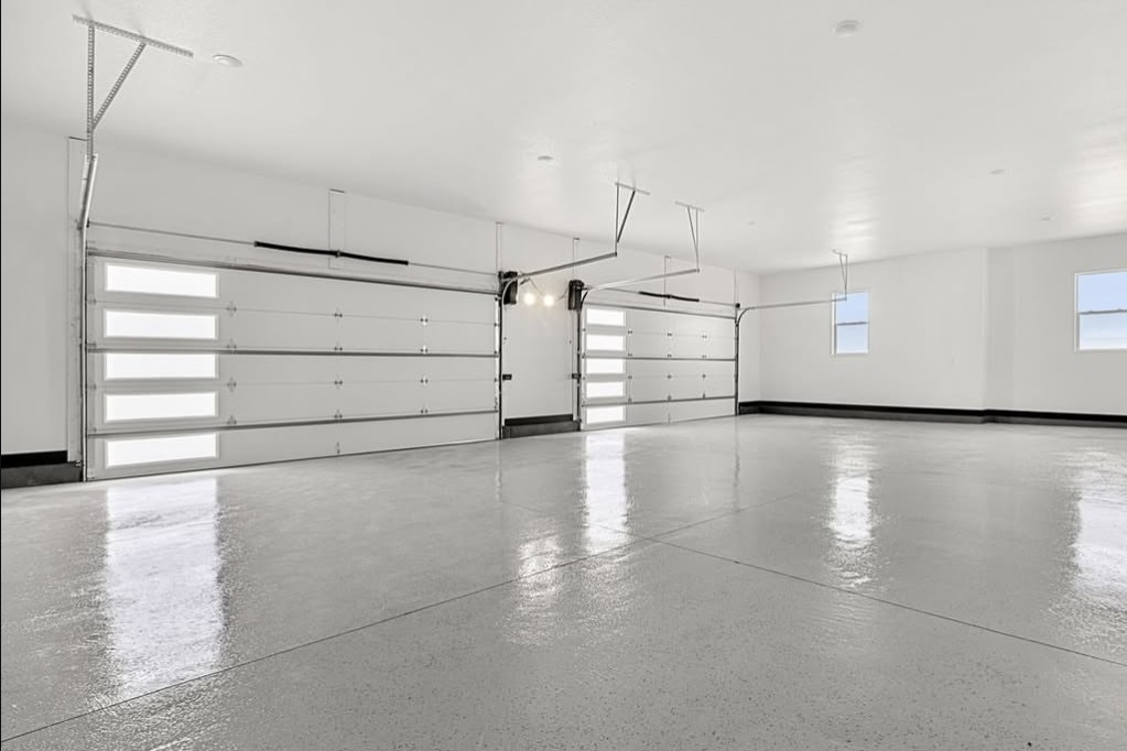 Three-car garage with epoxy floors
