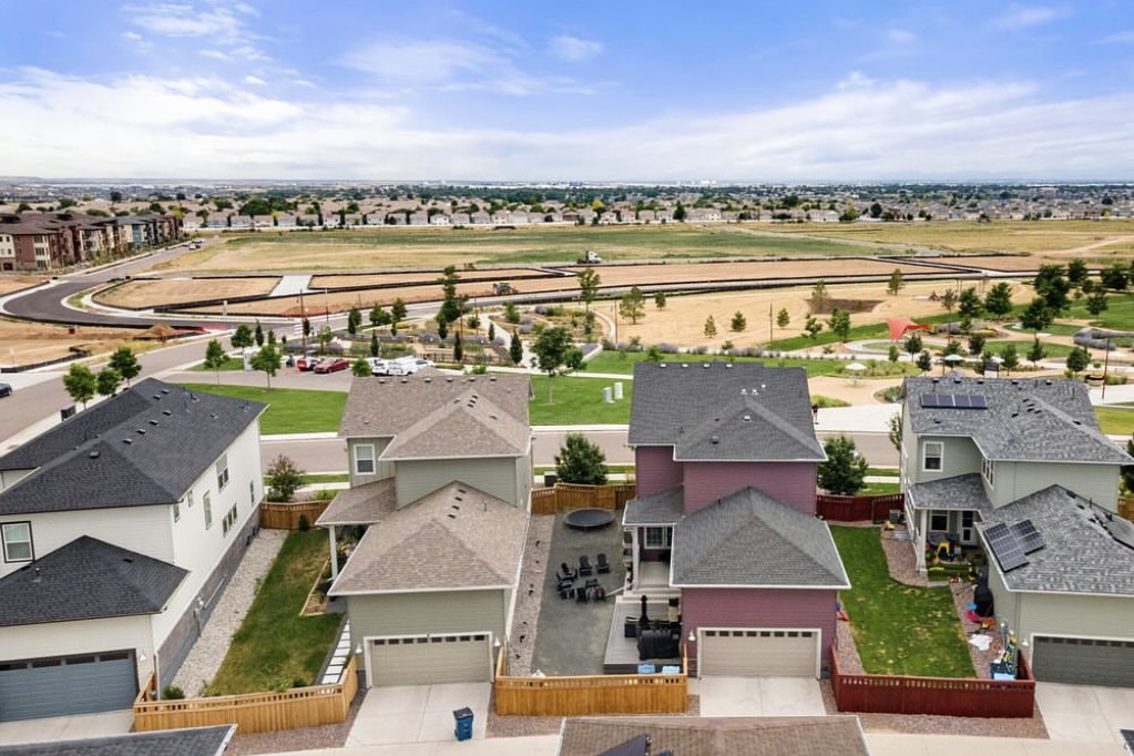 Drone photo of homes backing onto open space